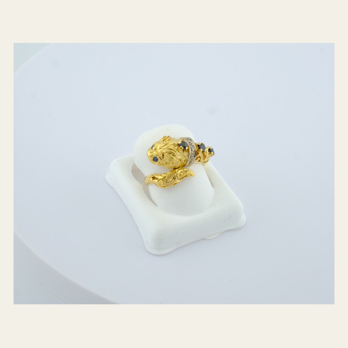18K Gold Snake Ring with Blue Sapphires and Diamond Accents